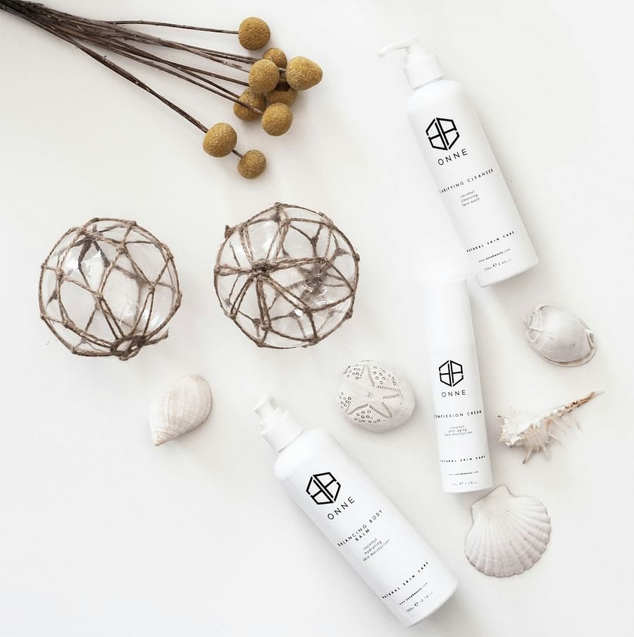 Season-agnostic skincare routine featuring a variety of skincare products and natural elements